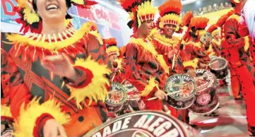  ??  ?? Revellers from Mocidade Alegre samba school perform during the second night of the Carnival parade at the Sambadrome in Sao Paulo, Brazil. — Reuters photo