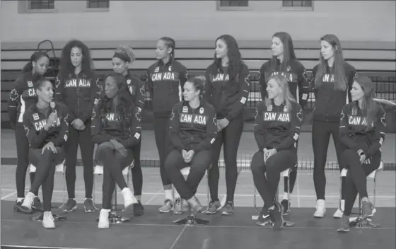  ?? RICK MADONIK, TORONTO STAR ?? Natalie Achonwa, third from right in the back row, was on hand Friday as Canada’s Olympic women’s basketball team was introduced at Ryerson University’s Mattamy Athletic Centre.