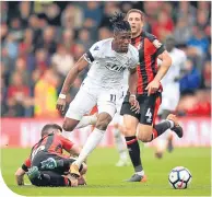  ??  ?? Wilfried Zaha breaks through the home defence