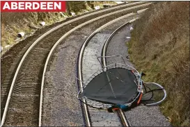  ?? ?? ABERDEEN
DANGEROUS: A trampoline blown onto the line near Cove brought disruption, while brave volunteer lifeboat crews faced rough conditions at sea
