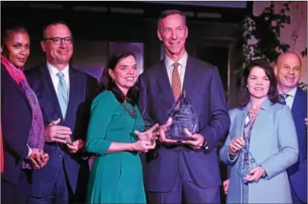  ?? PETE BANNAN — DIGITAL FIRST MEDIA ?? Vanguard’s senior leadership team includes: Anne Robinson, Glen Reed, Kathy Gubanich, Chairman and CEO Bill McNabb, Martha King, and Tom Rampulla. They received the 2016 Executives of the Year award from Chester County Chamber of Business & Industry at...