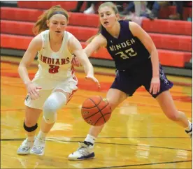  ?? Steph Miller ?? Kailyn Scott of Broken Bow looks to grab controll of the ball vs Minden on Dec. 15. She led all scorers with 21 points.