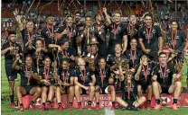  ??  ?? New Zealand men and women sevens players celebrate their dual success at the Hamilton stop of the World Series.