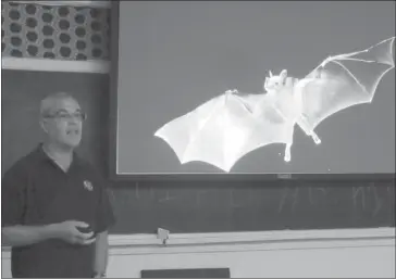  ?? ANN DAVIDSON ?? World-renowned bat specialist Dr. Michel Delorme took advantage of the Halloween period to present a lesson on bats to Knowlton Academy students last week.