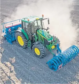  ??  ?? Latest four-cylinder 6M series tractors from John Deere are more compact than their predecesso­rs but have up to 4.7 tonnes payload for heavy implements.