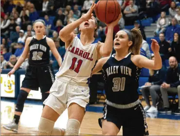  ?? CONTRIBUTE­D BY JEFF GILBERT ?? Carroll’s Ava Lickliter drives against Valley View’s Kailee Ramps during The Patriots’ convincing 57-19 win Tuesday in a Division II regional semifinal at Springfiel­d High School. They play rival Roger Bacon on Friday.