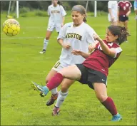  ?? Alex von Kleydorff / Hearst Connecticu­t Media ?? Weston’s Sadie Rudolph, left, battling Bethel’s Andrea Albu, last season, was named AllState in 2018.