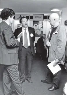  ??  ?? Ken Abernethy, chairman of Argyll and the Islands Enterprise, chats with Peter Chappell of Lochranza at the AIE Open Day which was held in the Ormidale Pavilion. 01_B43twe03