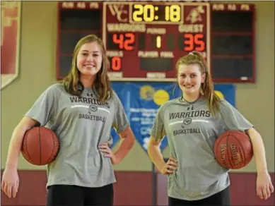  ?? PETE BANNAN — DIGITAL FIRST MEDIA ?? West Chester Henderson’s Grace Ferguson, left, and Abbey Shea, right, are the Daily Local News All-Area Girls Basketball Players of the Year. Shea averaged 11 points and 7 rebounds, while Ferguson averaged 12 points, 10 rebounds and 3 blocks for the...