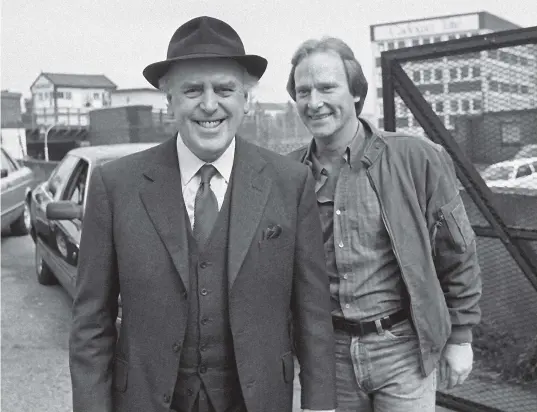  ?? GETTY IMAGES ?? George Cole as Arthur Daley, left, and Dennis Waterman as Terry McCann in the hugely successful television series Minder.