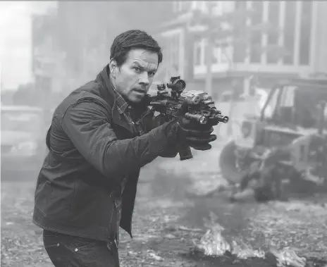  ?? STXFILMS ?? Veteran action star Mark Wahlberg puts his anger to work as tough guy spy Jimmy Silva in the new thriller Mile 22.