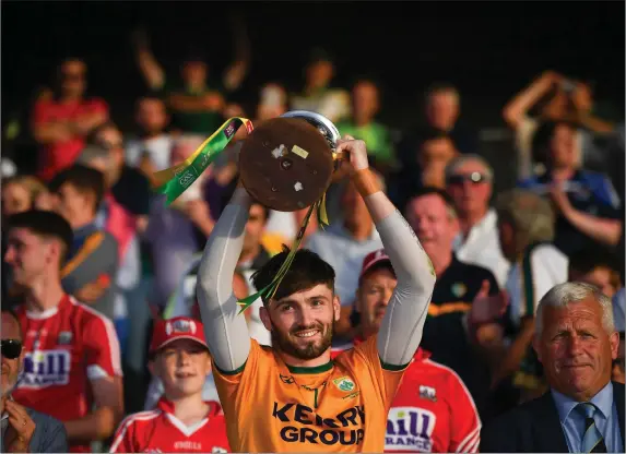  ??  ?? Kerry captain Shane Murphy lifts the cup following the Munster SFC Final win over Cork at Páirc Ui Chaoimh in Cork last Saturday evening. Photo by Sportsfile