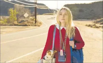  ?? Vivian Zink Magnolia Pictures ?? DAKOTA FANNING plays an autistic young woman and would-be writer on a mission in “Please Stand By.”