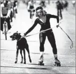  ?? ANNE CUSACK/CHICAGO TRIBUNE ?? Phyllis Jones skates and keeps tabs on her dog Lugur Ali near Lake Michigan in April 1982.