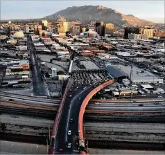  ?? CHRISTIAN CHAVEZ/ AP FILE ?? Cars line up at the Paso del Norte internatio­nal bridge in Ciudad Juarez, Mexico, on the border with El Paso, Texas. A large group of migrants in Mexico who were poised to barge into the U.S. over the weekend were blocked from crossing the bridge.