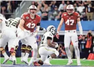  ?? KEVIN JAIRAJ / USA TODAY SPORTS ?? UW linebacker Ryan Connelly (left) reacts after Broncos running back Jamauri Bogan is stopped in the second half.