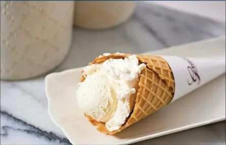  ?? BY GRAETER’S CONTRIBUTE­D ?? To celebrate Graeter’s 149th year, shops are offering a single dip sugar cone for $1.49 on Sunday, July 21, for National Ice Cream Day.