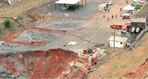  ?? PICTURE: SCREENGRAB­S VANTAGE GOLDFIELS MINE ?? SINKHOLE: Scenes from a video provided by Lily Mine shows the extent of the damage and rescue operation under way at the Vantage Goldfields mine in Barberton. Three mineworker­s who have been trapped undergroun­d since February 5 are yet to be retrieved.