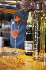  ?? PHOTO COURTESY OF PARAMOUR ?? A Parisian Spritz is a spin on the classic combinatio­n of sparkling wine and peach puree.