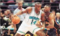  ?? AP FILE ?? Anthony Mason, left, shown jousting with New York’s Larry Johnson while playing for Charlotte in 1996, was one of the most physical players of his era.