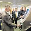  ?? JACOB LANGSTON/STAFF ?? Orlando Internatio­nal Airport unveils a new kiosk to help speed the security process for internatio­nal travelers. OIA may lose 10 customs and border patrol officers soon.