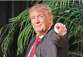  ??  ?? Republican presidenti­al candidate Donald Trump reacts as he walks off the stage after a roundtable event Tuesday in Miami.