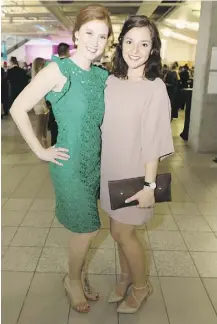  ??  ?? Brittany Pitruniak, left, and Danika McConnell show their support for MacEwan University at the Mad Hatter’s Gala fundraiser, now in its 31st year,