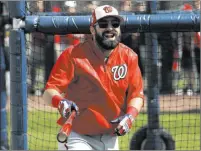  ?? DAVID J. PHILLIP THE ASSOCIATED PRESS ?? Washington Nationals center fielder Adam Eaton laughs while taking batting practice at spring training Sunday in West Palm Beach, Fla. Eaton, who is expected to bat first or second in the lineup, is only 5 feet, 8 inches tall — 3 inches shorter than any of his teammates.