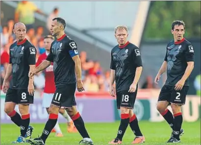  ?? MATTHEW ASHTON / GETTY ?? Butt, Giggs, Scholes y Gary Neville en un partido de veteranos celebrado en el 2014