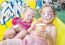  ??  ?? After face painting and cool treats, Zoe, 3, and Evie Green, 4, were pretty pleased to be at the Brickworks.