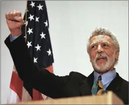  ??  ?? In this Nov. 17, 1997 file photo Democratic Rep. Ron Dellums raises his fist while announcing his retirement from Congress at a news conference in Oakland. AP PHOTO/BEN MARGOT