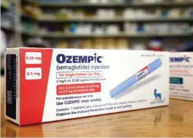  ?? MARIO TAMA/GETTY IMAGES/TNS ?? Boxes of the diabetes drug Ozempic are shown in April at a Los Angeles pharmacy.