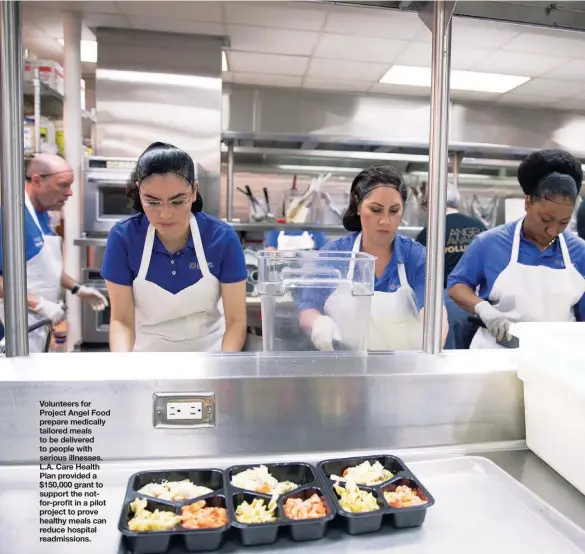  ??  ?? Volunteers for Project Angel Food prepare medically tailored meals to be delivered to people with serious illnesses. L.A. Care Health Plan provided a $150,000 grant to support the notfor-profit in a pilot project to prove healthy meals can reduce hospital readmissio­ns.
