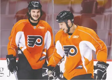  ?? ALEX UROSEVIC / POSTMEDIA NEWS FILES ?? Daniel Carcillo, left, and Riley Cote, seen here in 2010, were teammates on the Philadelph­ia Flyers. They are both now retired from the NHL and speaking out about ways in which they have sought to heal from physical and mental demands of the game.