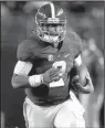  ?? AP/BRYNN ANDERSON ?? Alabama freshman quarterbac­k Jalen Hurts set a season-season rushing record for a Crimson Tide quarterbac­k with 840 yards on the ground to go along with his 2,454 yards passing.