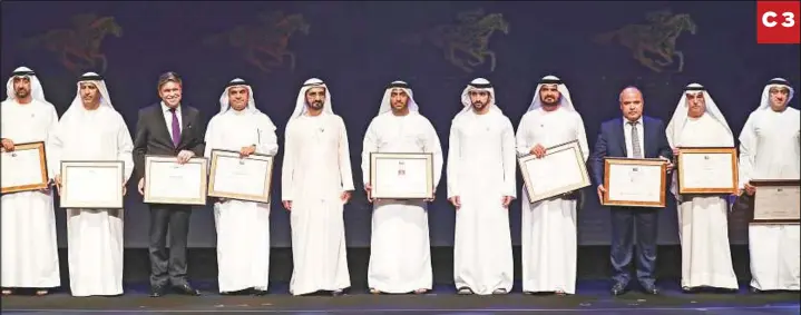  ?? WAM ?? Shaikh Mohammad with the Dubai World Cup sponsors’ representa­tives during the Sponsor Appreciati­on Awards at Meydan on Thursday. With $30 million in prize money on offer, the Dubai World Cup meeting is by far the richest horse racing event anywhere on the planet.