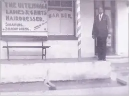  ??  ?? Morar Jaga in Uitenhage in 1910, the first of four generation­s of Govan family barbers in South Africa.