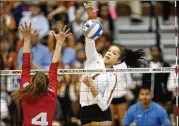  ?? CONTRIBUTE­D BY STEPHEN SPILLMAN ?? Texas’ Micaya White (1) was named the Big 12’s preseason player of the year. White led Texas in kills during each of the past two seasons and has averaged 3.8 kills and 2.4 digs per set in her career.