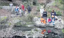  ?? ARIC CRABB — STAFF ARCHIVES ?? Students on a field trip look over the Japanese
Pool at the University of California Botanical Garden at Berkeley on March 5, 2020 in Berkeley.