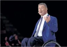  ?? THE CANADIAN PRESS FILES ?? Rick Hansen speaks at the Invictus Games Opening Ceremony in Toronto on Sept. 23, 2017. New research suggests that failing to make accessibil­ity for people with disabiliti­es a higher priority for Canadian businesses would cost the country billions of dollars in lost economic growth.