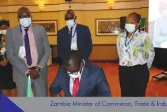  ?? ?? Zambia Minister of Commerce, Trade & Industry, Hon. Chipoka Mulenga, signs the Kampala Protocol