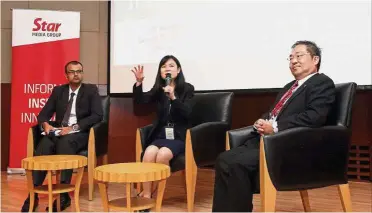  ??  ?? SST talk: (from left) Helmi, Ng and executive director for tax risk management Soh Lian Seng at the talk in Menara Star, Petaling Jaya.