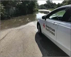  ?? SUBMITTED PHOTO ?? A Red Cross vehicle is parked at the entrance to a flooded community in Philadelph­ia on Wednesday.