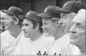  ?? RAY STUBBLEBIN­E — THE ASSOCIATED PRESS FILE ?? New York Yankees, from left, Mickey Mantle, Yogi Berra, Whitey Ford, Joe DiMaggio and Casey Stengel gather on the steps of Shea Stadium in New York before an Old Timer’s game Aug. 3, 1974.