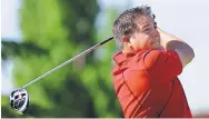  ?? JIM THOMPSON/JOURNAL ?? Adam Roybal, general manager of the UNM North Golf Course, watches a drive during U.S. Open local qualifying Tuesday.