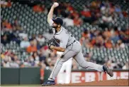  ?? MICHAEL WYKE — THE ASSOCIATED PRESS ?? Detroit Tigers starting pitcher Michael Fulmer throws against the Houston Astros during the first inning of a baseball game Wednesday, in Houston.