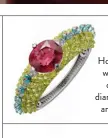  ??  ?? Holika bracelet in white gold with chrysobery­ls, diamonds, rubellite and tourmaline­s