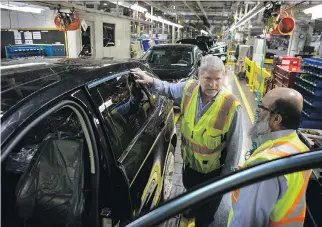  ?? CHRIS YOUNG/THE CANADIAN PRESS FILES ?? Ford Edges stand on a production line at Ford’s assembly plant in Oakville, Ont. RBC analysts predict that auto manufactur­ing will be among the industries that would be hardest hit with a four-per-cent increase in tariffs for Canadian exports to the...