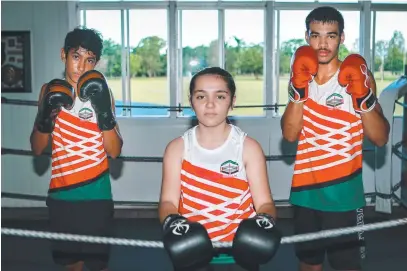  ?? ?? Babinda boxers Sanraj Grewal, 13, Dakoda Masina, 13, and state champion Kevin Simpson, 15, prepare for the annual Babinda Boxing Tournament on April 23. Picture: Arun Singh Mann