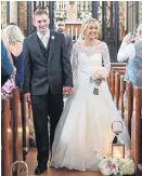  ??  ?? Happy couple walk down the aisle at St Alban’s Church, Macclesfie­ld